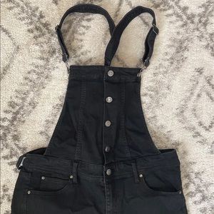 Skinny Jean overalls, stretchy black, slightly distressed. Worn once!